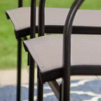 Captiva Designs - Ensemble de salle à manger 7 pièces pour terrasse extérieure avec table en acier à plateau à lattes aspect bois et chaises fixes en toile