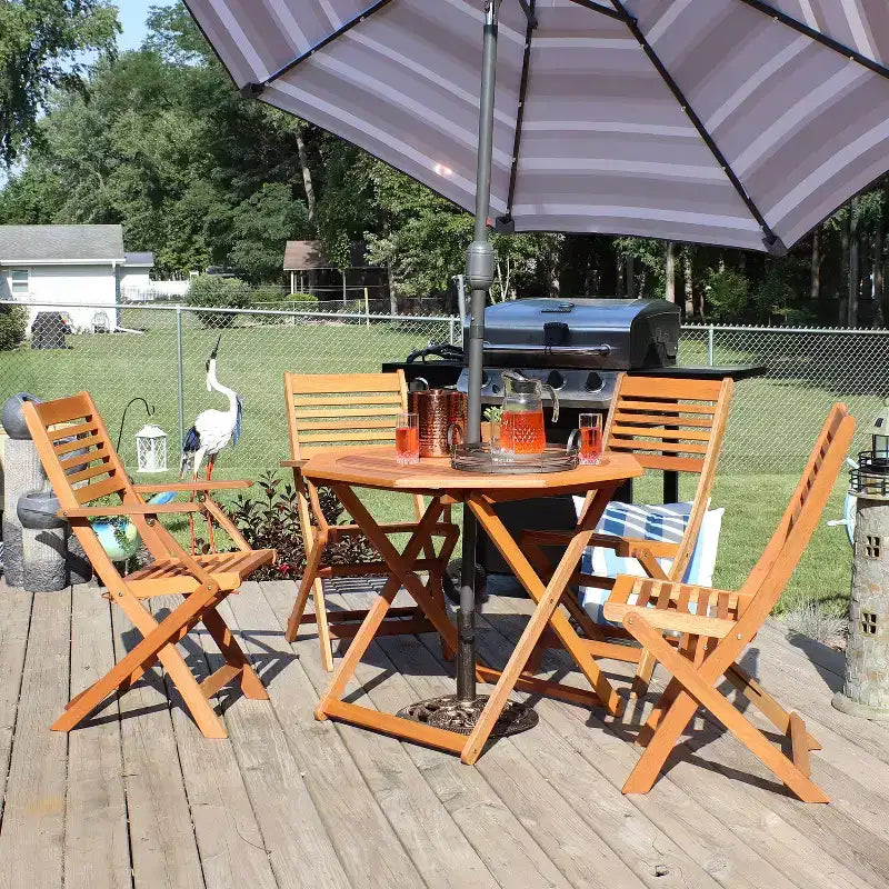 Sunnydaze Outdoor Meranti Wood with Teak Oil Finish Folding Patio Dining Table and Chairs - Brown - 5pc