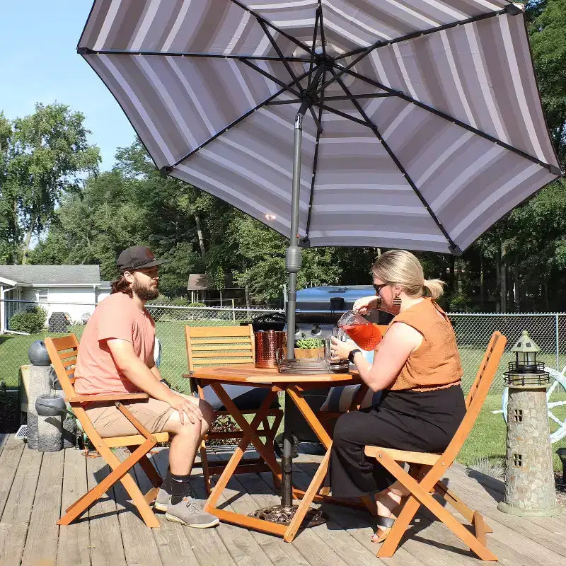 Sunnydaze Outdoor Meranti Wood with Teak Oil Finish Folding Patio Dining Table and Chairs - Brown - 5pc