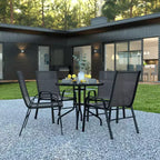 Emma and Oliver Five Piece Patio Table Set with Round Metal Table with Tempered Glass Top and 4 Flex Comfort Stacking Chairs
