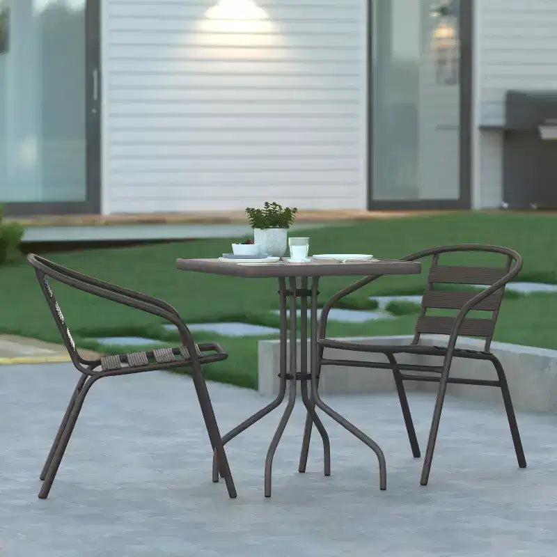 Emma and Oliver 23.5'' Square Glass Top Metal Table with 2 Aluminum Slat Stack Chairs