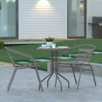 Emma and Oliver 23.75'' Round Glass Top Metal Table with 2 Aluminum Slat Stack Chairs
